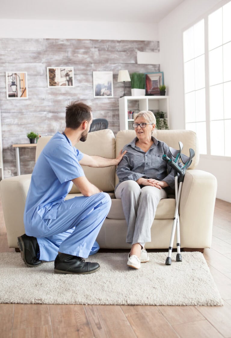 Male physiotherapist visitor in a nursing home